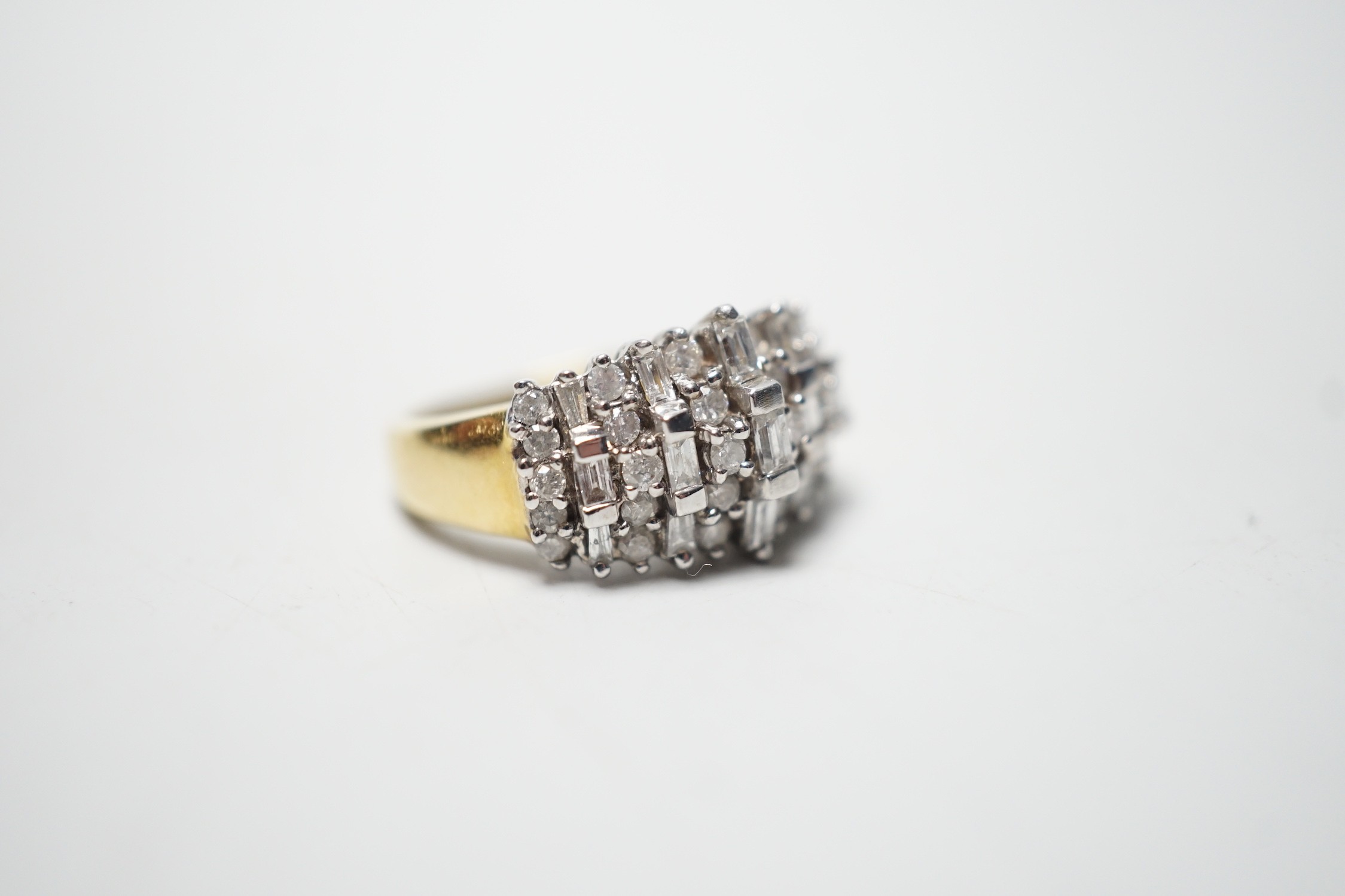 A modern yellow metal, round and baguette cut diamond set half hoop cluster ring, size L/M, gross - Image 3 of 4