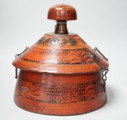 A Chinese wooden painted spice container and cover. 28cm tall