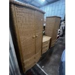A pair of Pier furniture bowfront rattan wardrobes, width 95cm, depth 58cm, height 184cm together