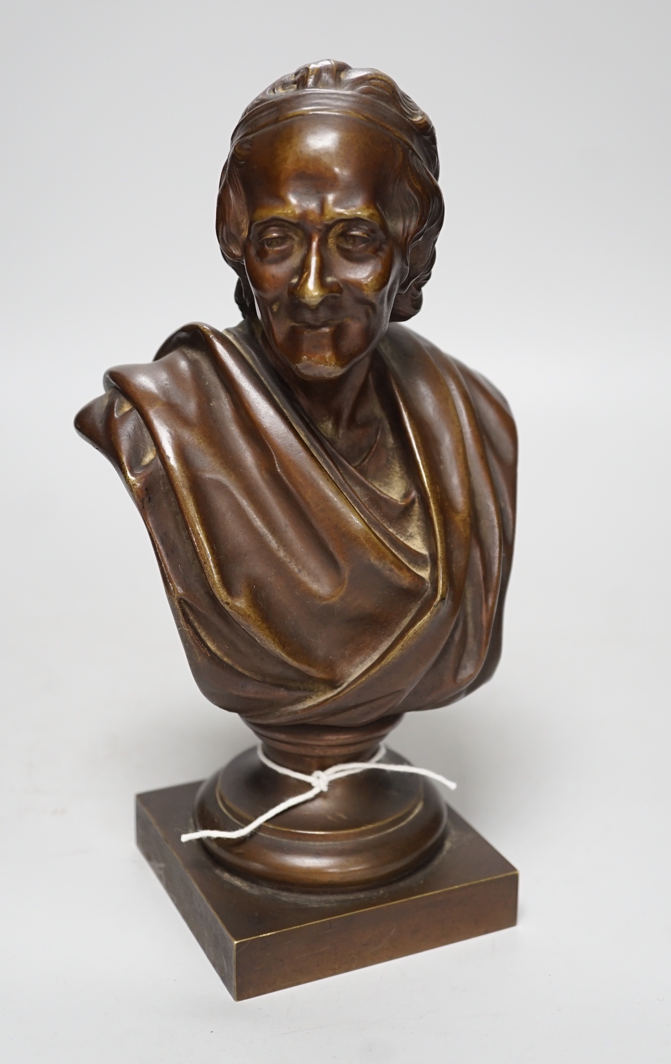 An early 20th century bronze bust of Voltaire, 24cm