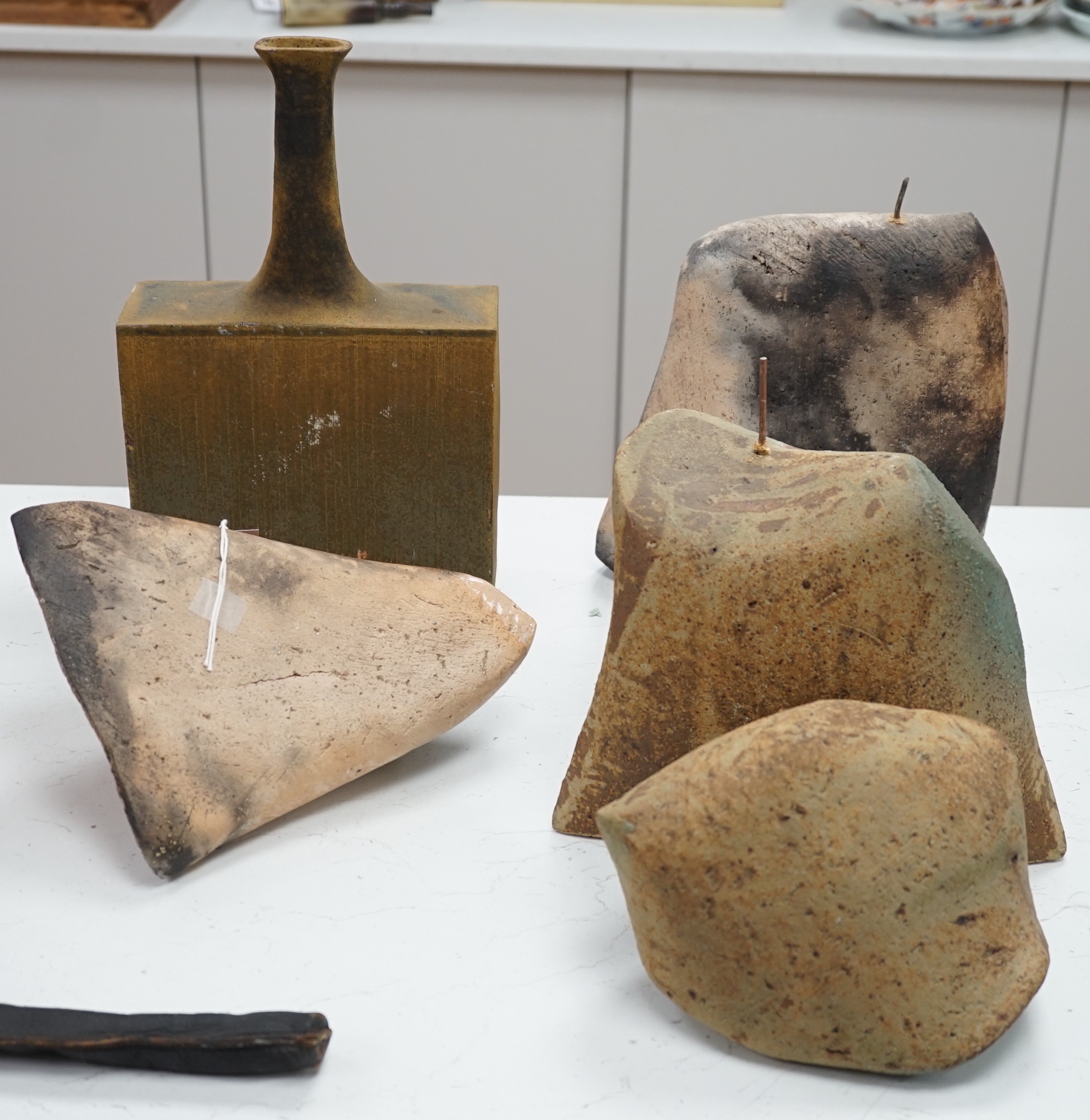 Two contemporary stoneware sculptures and a bottle vase, 35cm