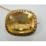 A yellow metal mounted cushion cut citrine set brooch, 27mm, gross weight 6.9 grams.