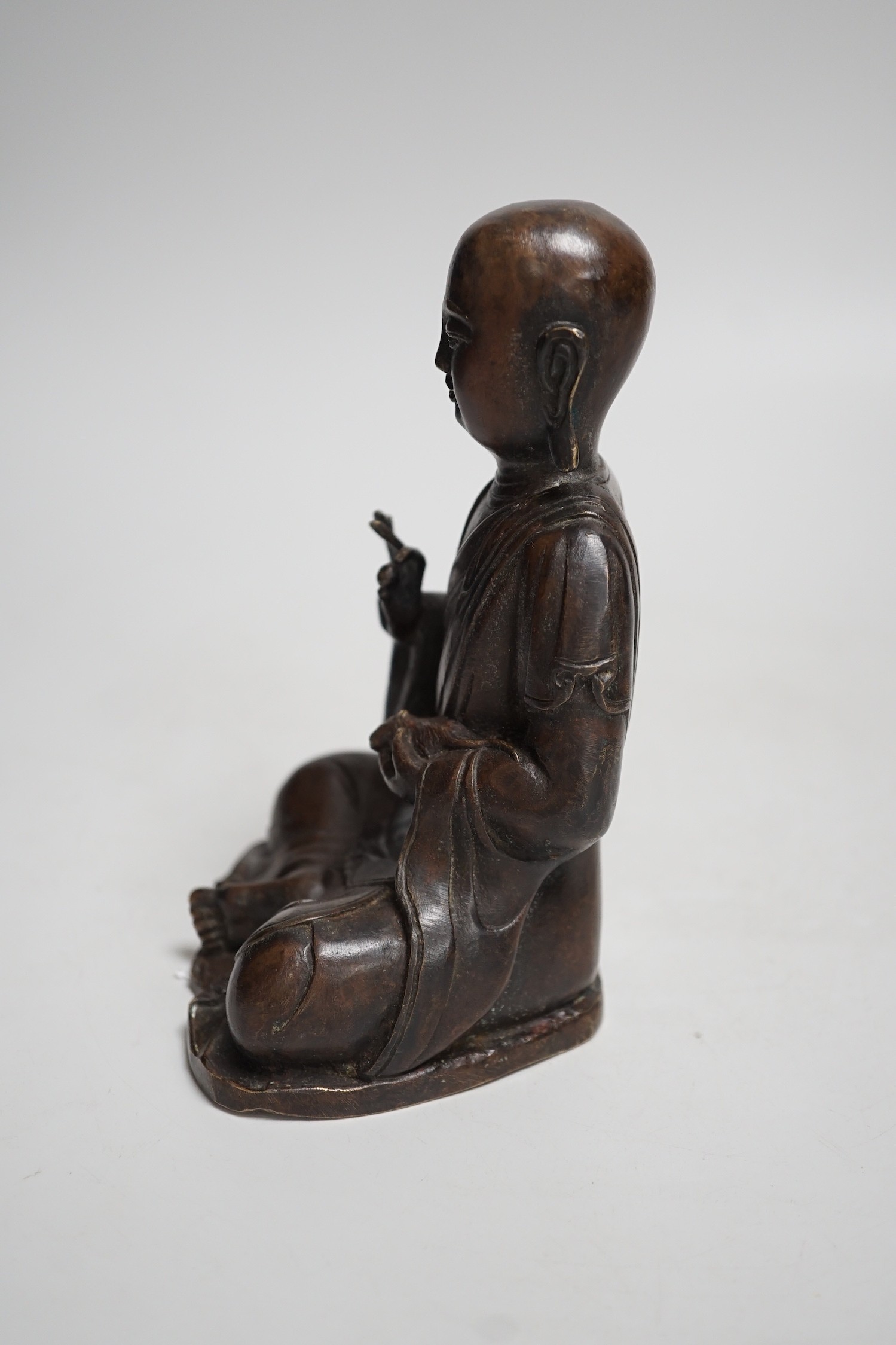 A Nepalese bronze figure of a seated immortal, probably 17th / 18th century, 16cm - Image 2 of 5