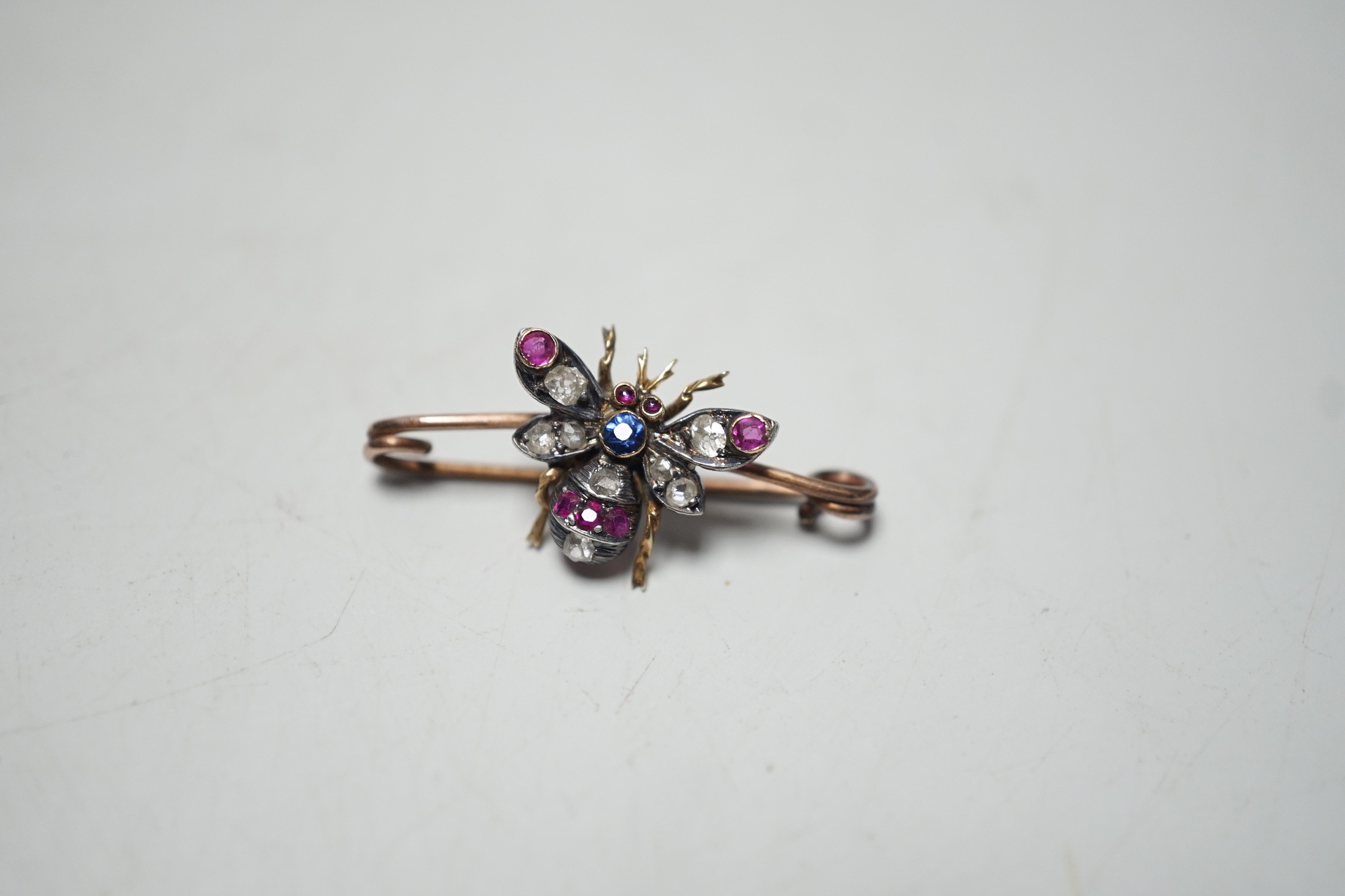 A late Victorian yellow metal, ruby, sapphire and diamond set bug brooch, 30mm, gross weight 2.2 - Image 2 of 4