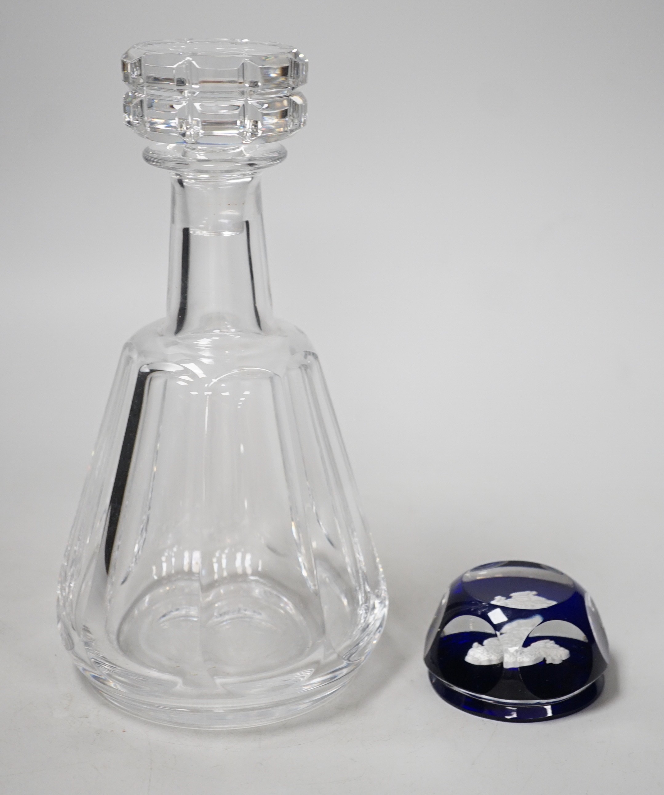 A Baccarat decanter and a Baccarat sulphide paperweight. Tallest 24cm