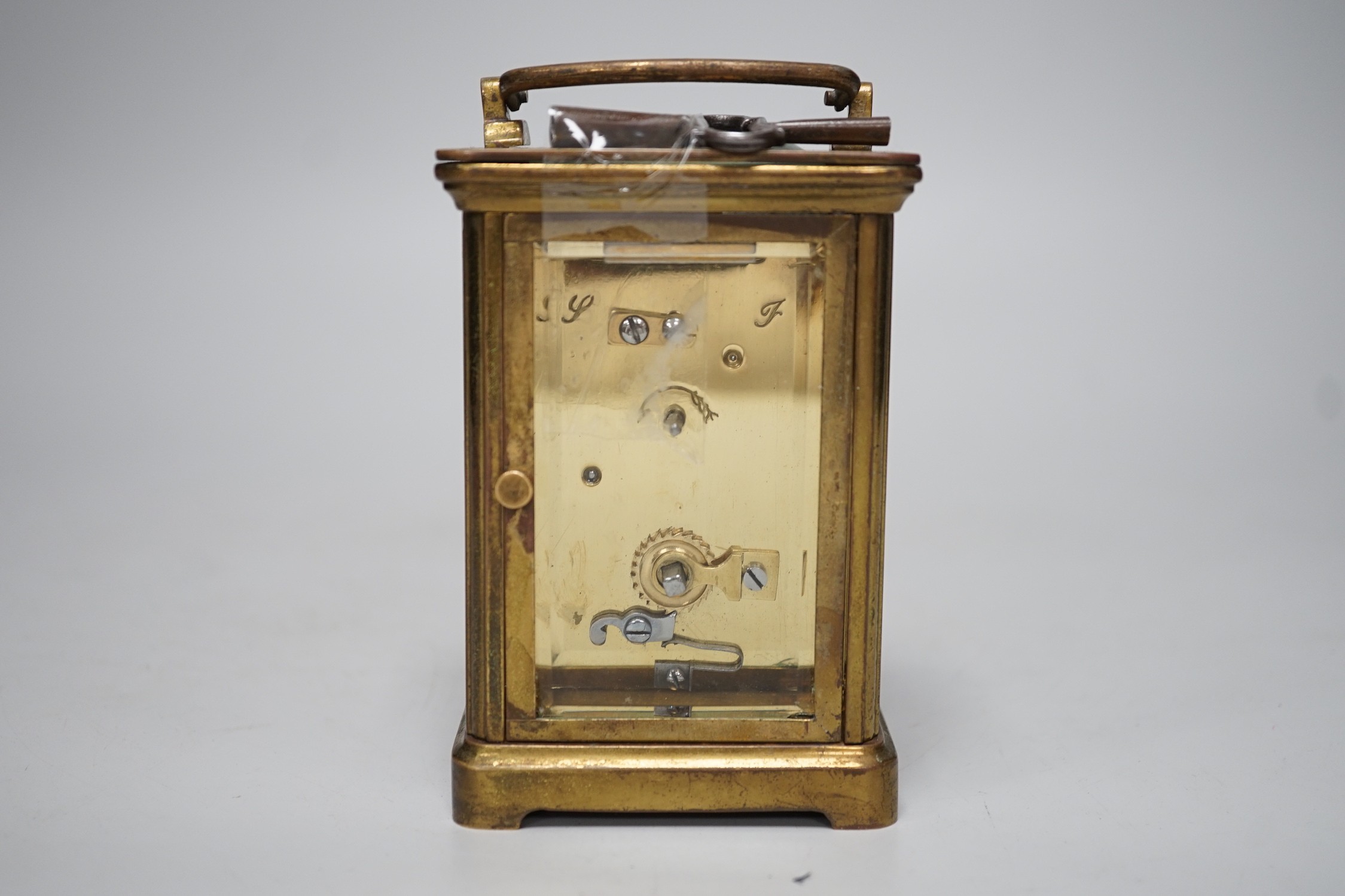 A 19th century brass carriage timepiece with black Roman numerals and second markers over a white - Image 4 of 4