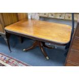 A Regency rectangular mahogany tilt top dining table, length 136cm, width 94cm, height 71cm