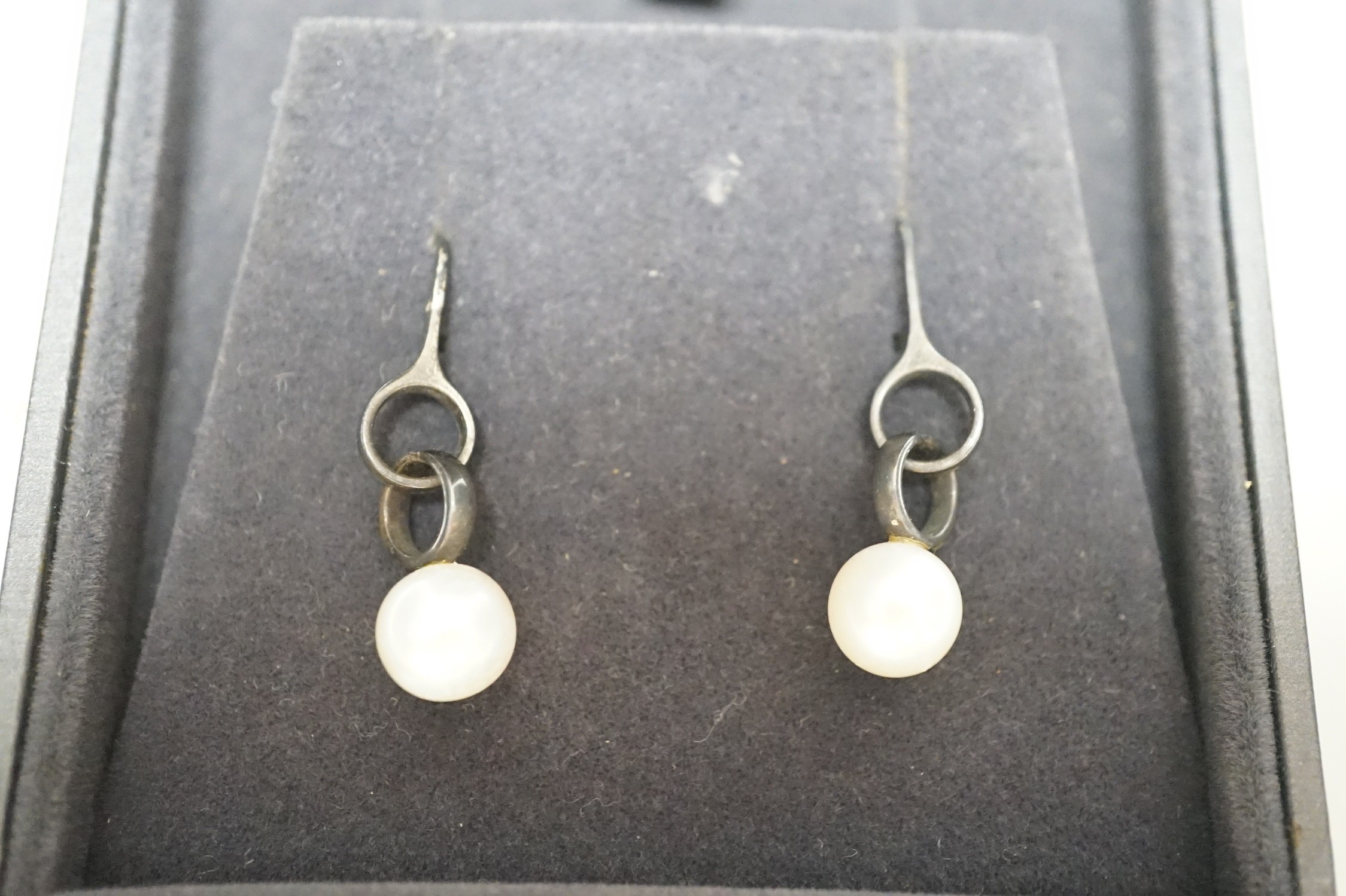 A modern pair of Georg Jensen silver and cultured pearl set drop earrings, 31mm, in Georg Jensen - Image 2 of 2