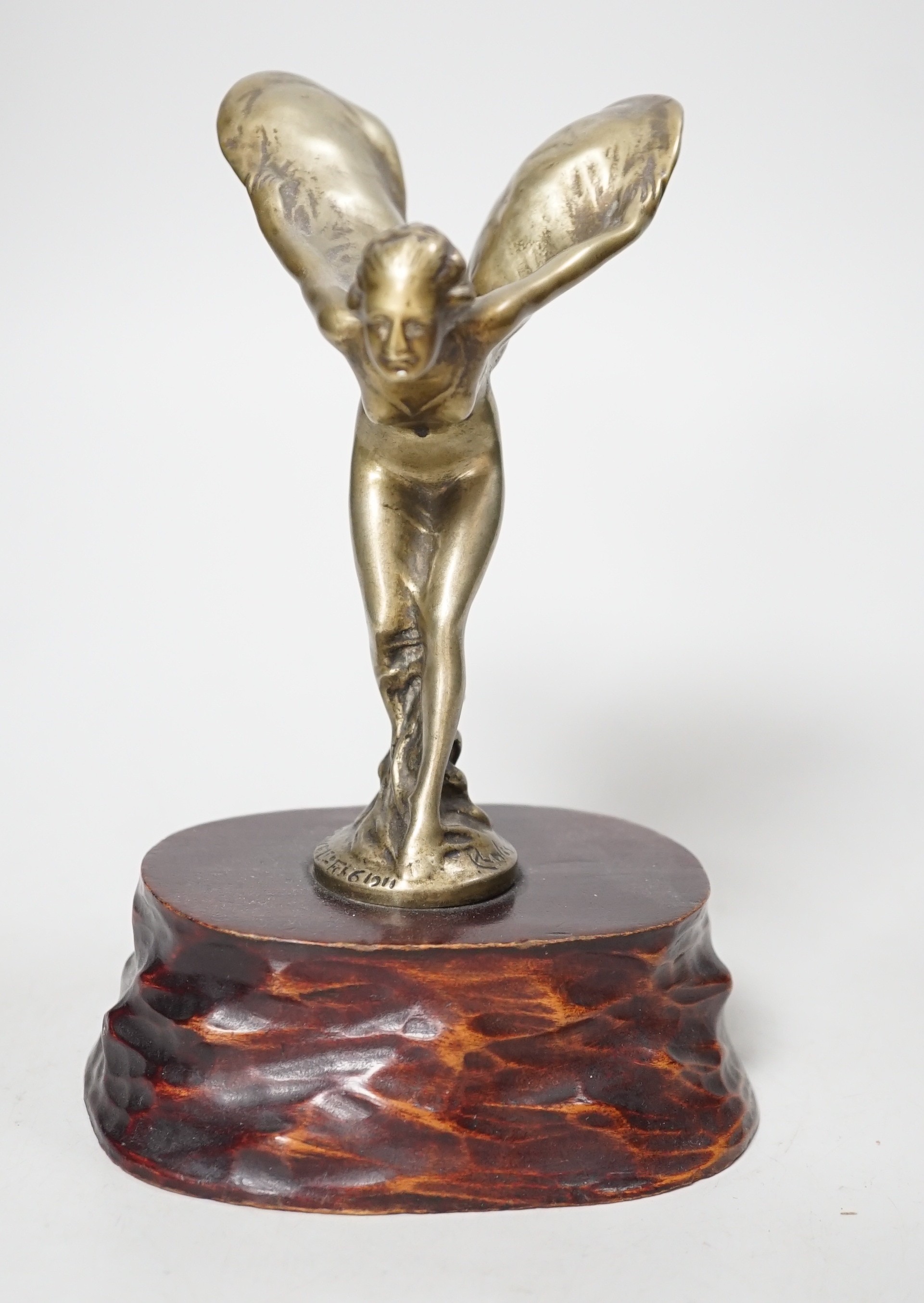After Charles Sykes, a gilt metal Rolls Royce car mascot - ‘’Spirit of Ecstasy’’, inscribed and