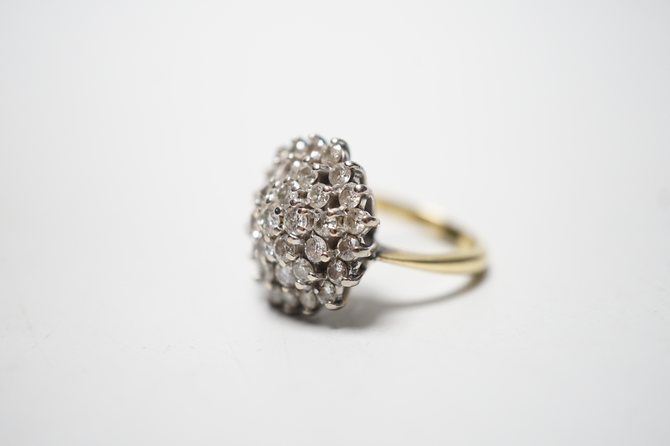 A modern 18ct and diamond set circular cluster ring, size I/J, gross 7.9 grams. - Image 2 of 4