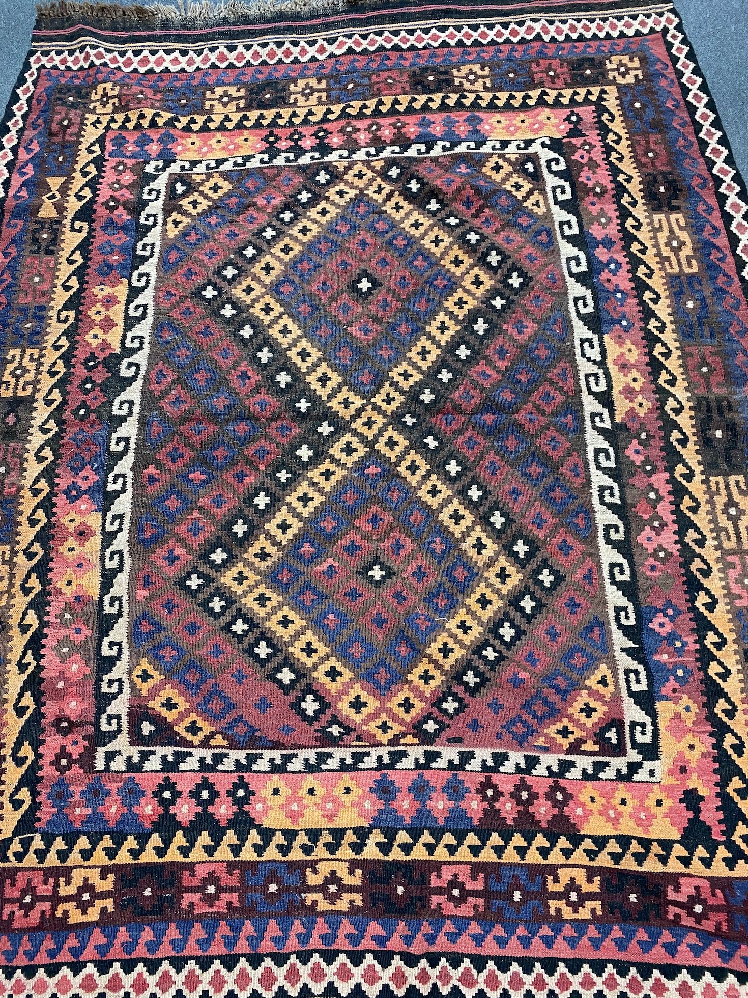 A polychrome flatweave rug, 203 x 160cm - Image 2 of 3