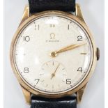 A gentleman's 1950's 9ct gold Omega manual wind wrist watch, movement c.265, case diameter 34mm,