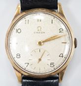 A gentleman's 1950's 9ct gold Omega manual wind wrist watch, movement c.265, case diameter 34mm,