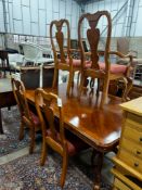 A reproduction Queen Anne style banded cherry twin pillar extending dining table, length 240cm