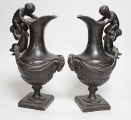 A pair of classical revival bronze urn side ornaments with cast rams head bodies. 32cm tall