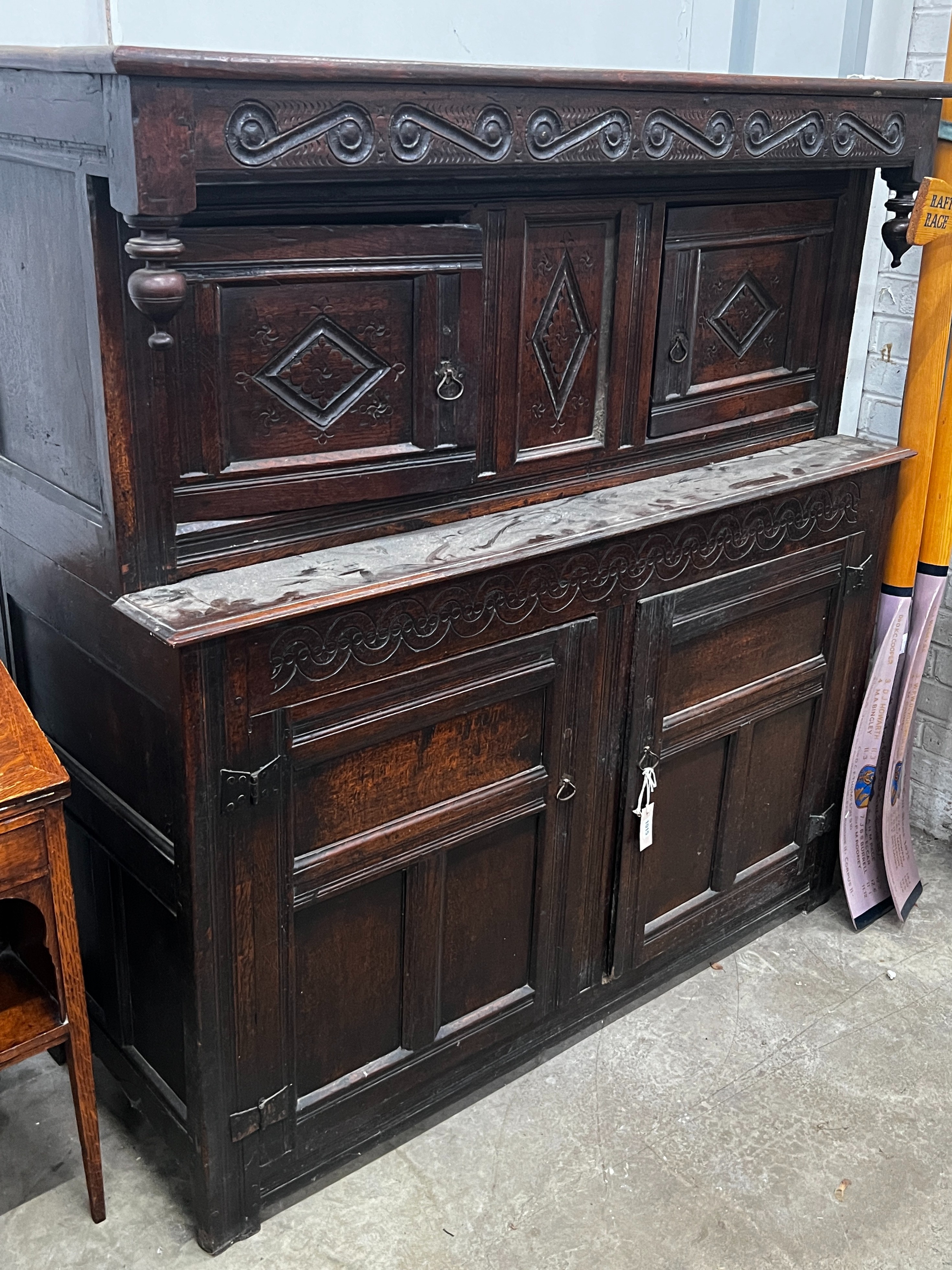 A 17th century oak court cupboard, width 139cm, depth 57cm, height 146cm