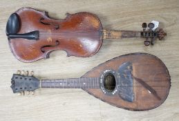 An Italian balloon back mandolin with tortoiseshell overlay, circa 1900, label for Pietro Tonelli of