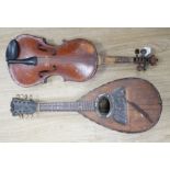 An Italian balloon back mandolin with tortoiseshell overlay, circa 1900, label for Pietro Tonelli of