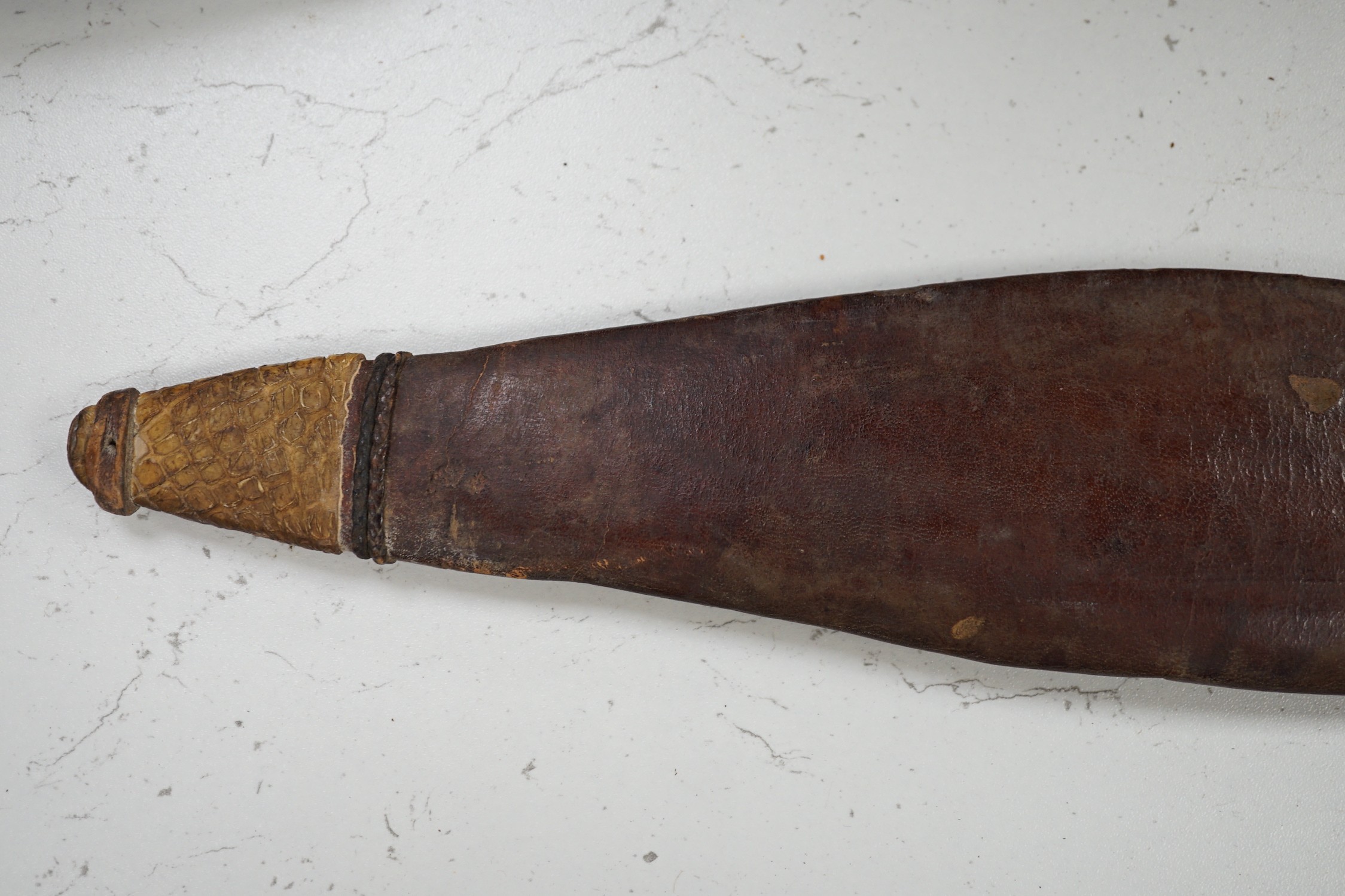 A Sudanese Kaskara sword with snake skin mounted leather scabbard, total length 79cm - Image 2 of 2