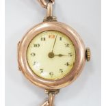 An early 20th century 9ct gold Rolex manual wind wrist watch, with Arabic dial, case diameter