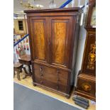 A George IV mahogany linen press of small proportions with three long drawers, width 115cm, depth