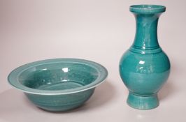 A Chinese turquoise-glazed vase and bowl. Tallest 20.5cm