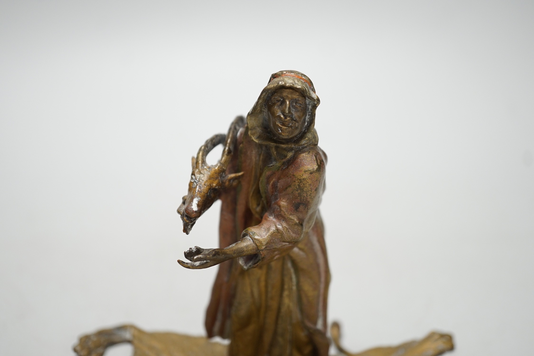 An Austrian cold painted bronze model of a Bedouin trader, depicted holding an Ibex head, standing - Image 2 of 5