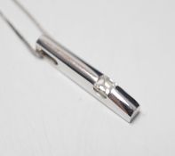 A modern 18ct white gold and solitaire diamond set pendant, 22mm, on an 18ct white gold fine link