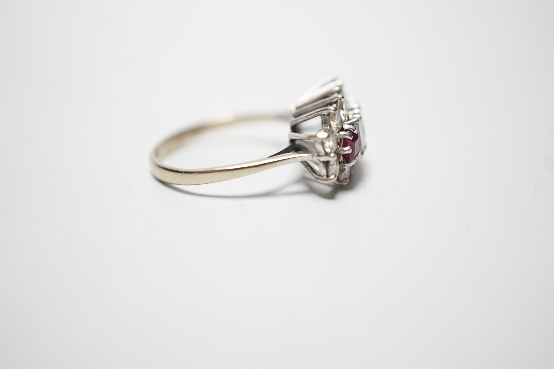 A modern 18ct white gold, square cut ruby and round and baguette cut diamond set cluster ring, - Image 3 of 4