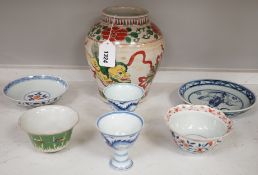 A Chinese wucai vase, two Imari bowls, a pair of Chinese blue and white dragon stem cups, Xuande