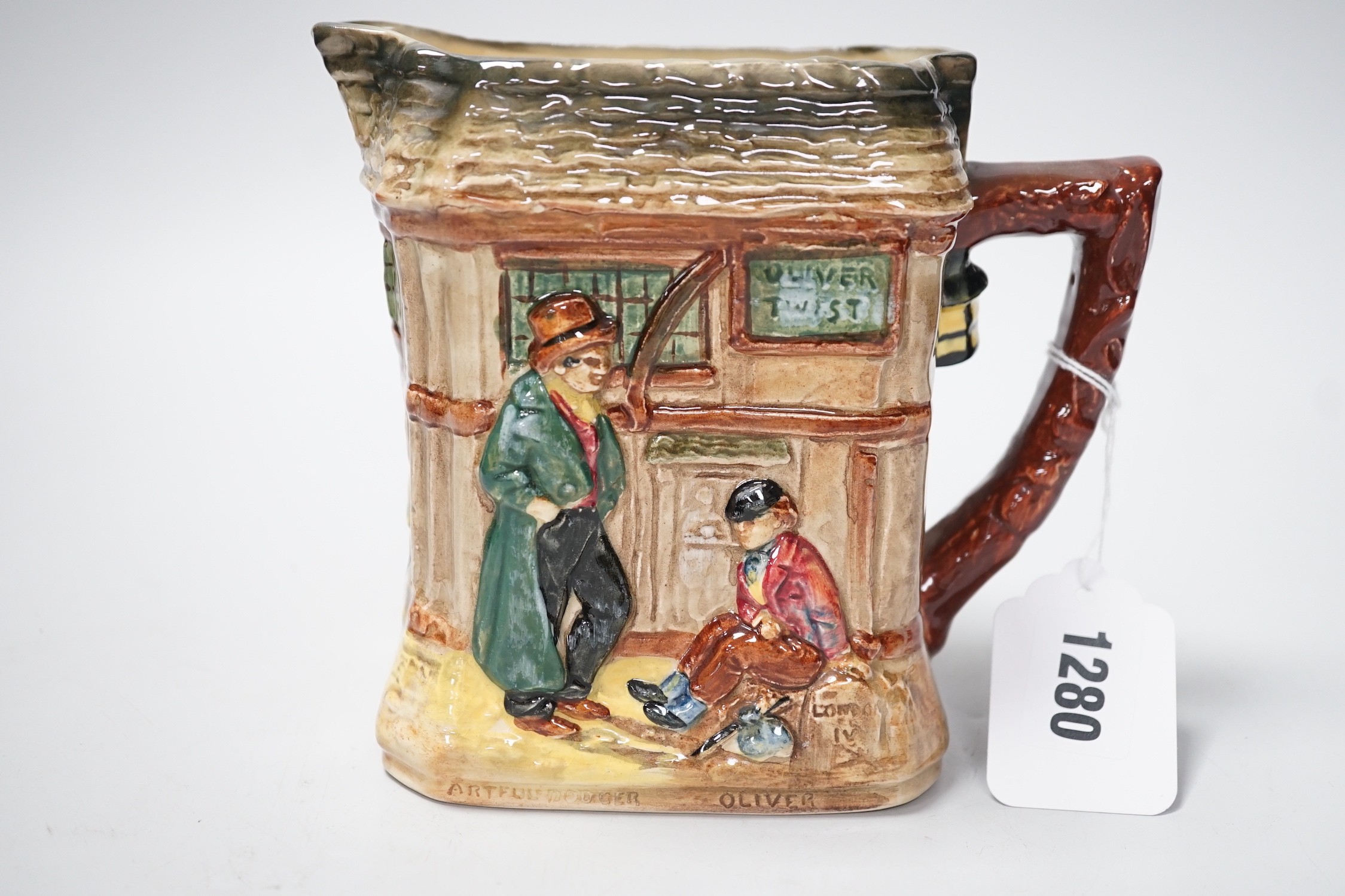 A Doulton Oliver Twist series ware jug and a Pelham puppet - Image 6 of 7
