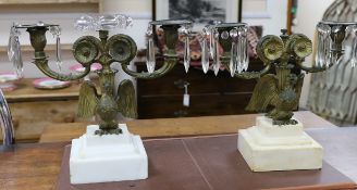 A pair of 19th century eagle two branch candelabra,34cms high x 3cms wide