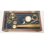 A 19th century monocular microscope, in mahogany case