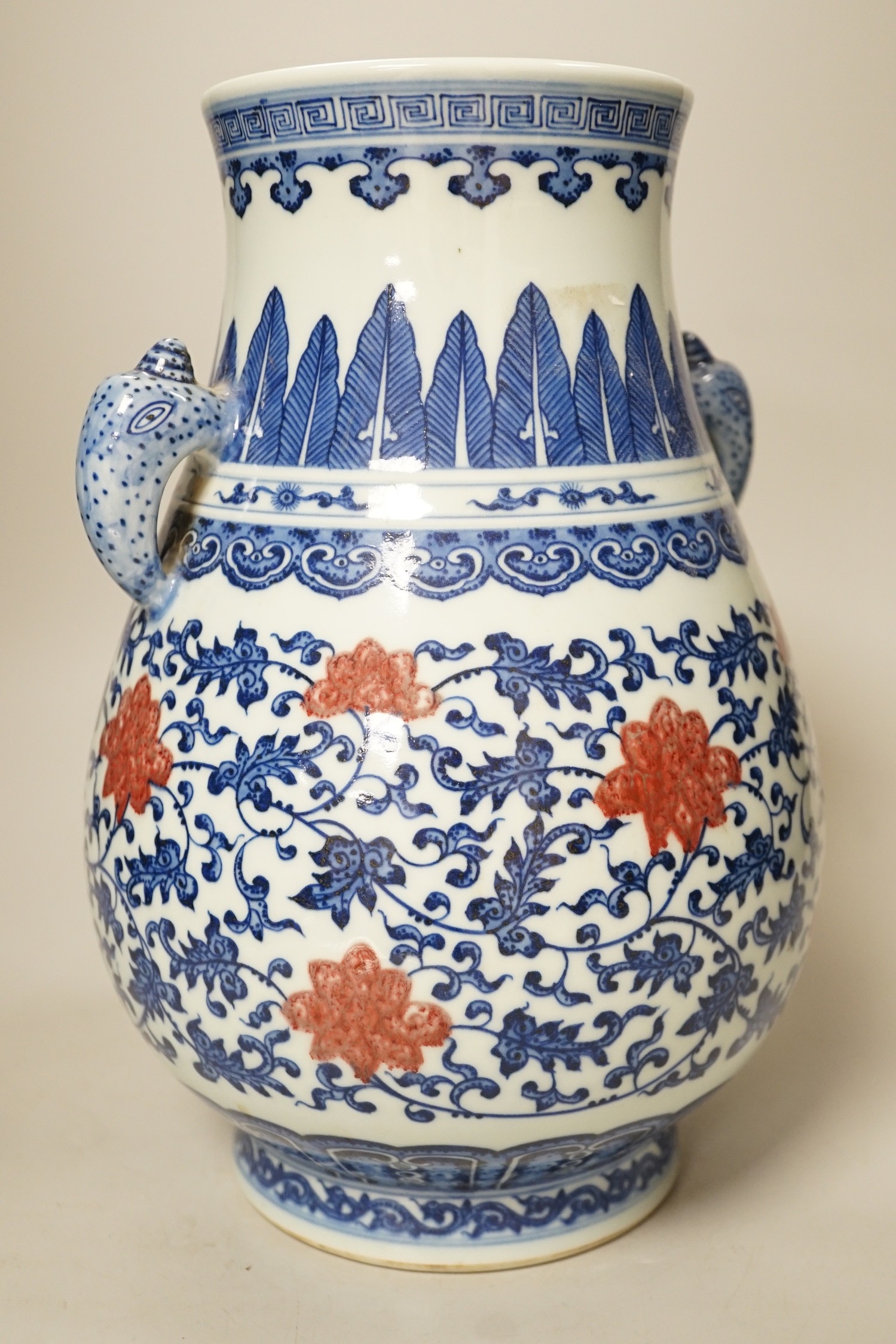 A Chinese underglaze blue and copper red two-handled vase. 31cm tall - Image 3 of 4