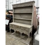 A contemporary Oka painted potboard dresser, width 140cm, depth 47cm, height 206cm