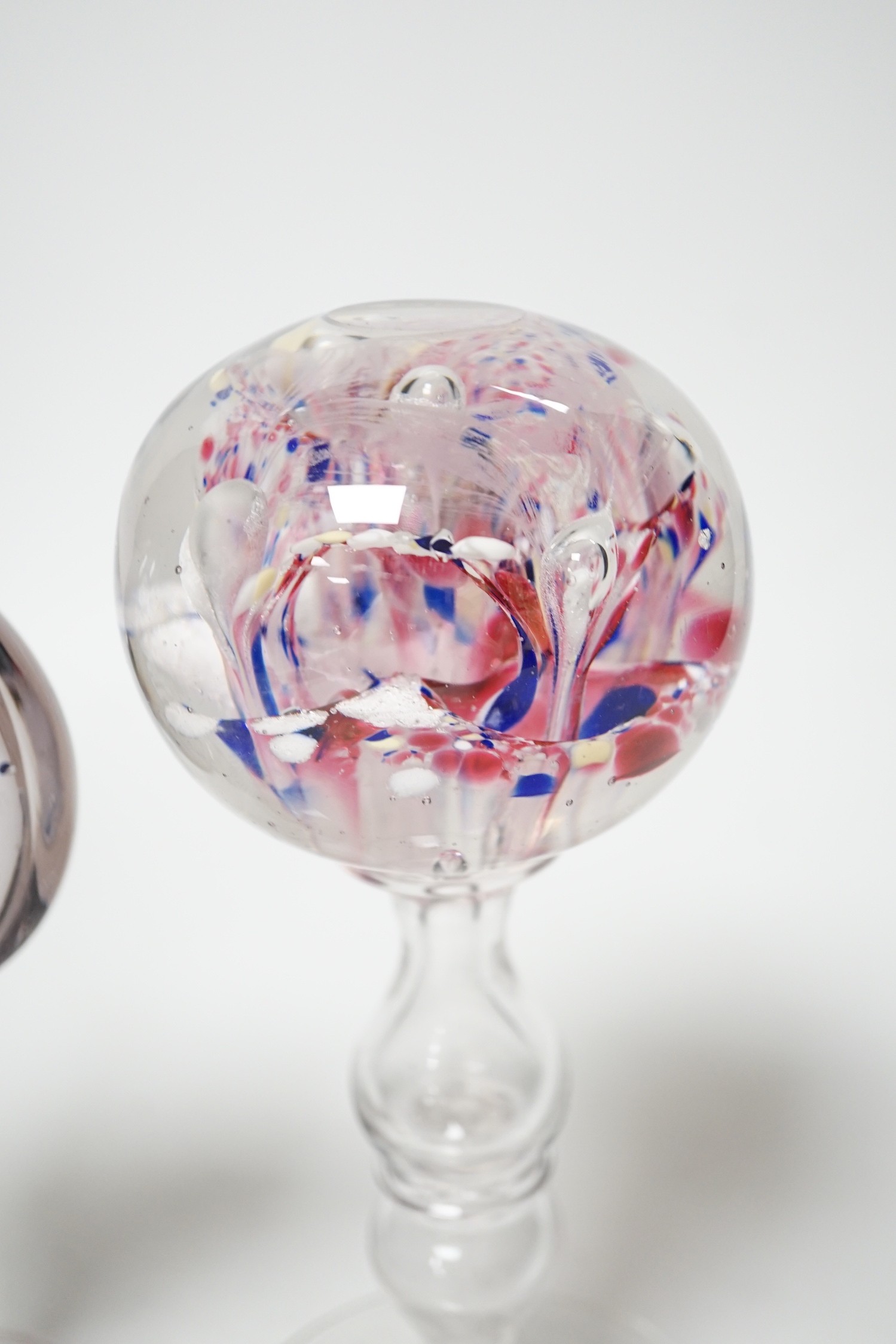 Two 19th century glass pedestal ornaments, one possibly a wig stand, the other containing a sulphide - Image 3 of 4
