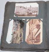 Three albums of topographical postcards
