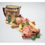 A Doulton Oliver Twist series ware jug and a Pelham puppet