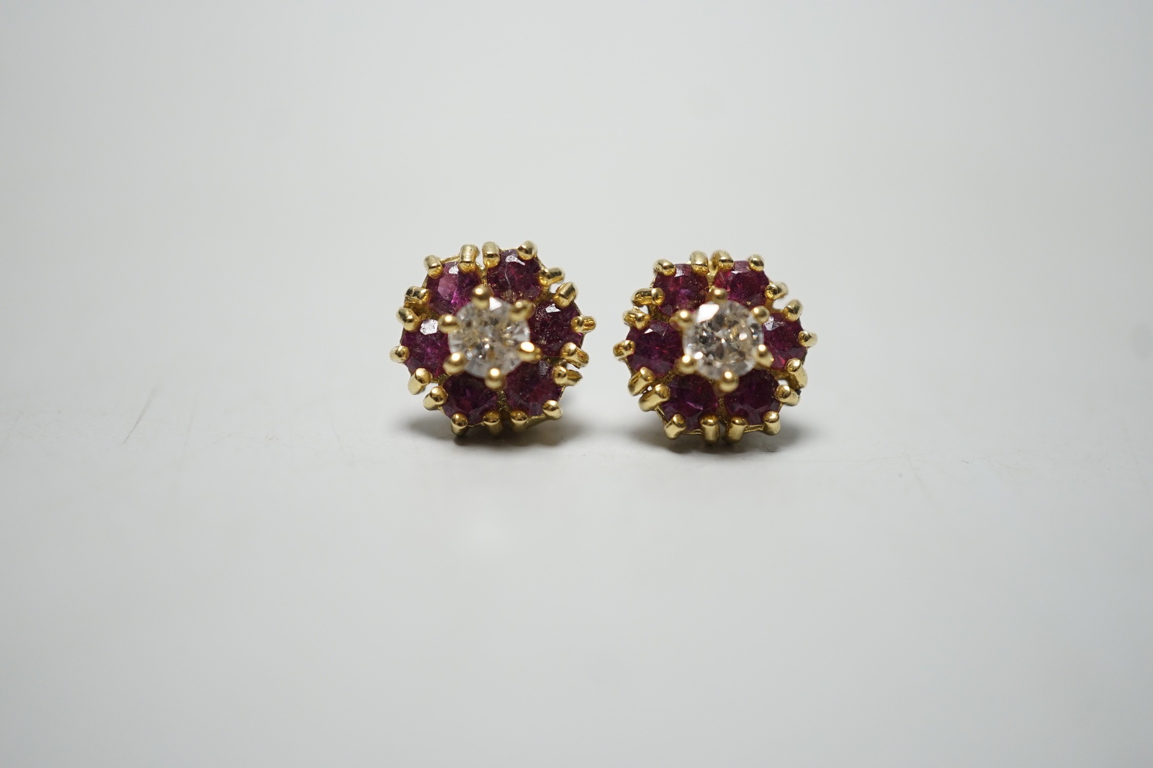 A pair of 18ct gold, diamond and garnet? circular cluster ear studs, 9mm, gross weight 4 grams. - Image 2 of 4