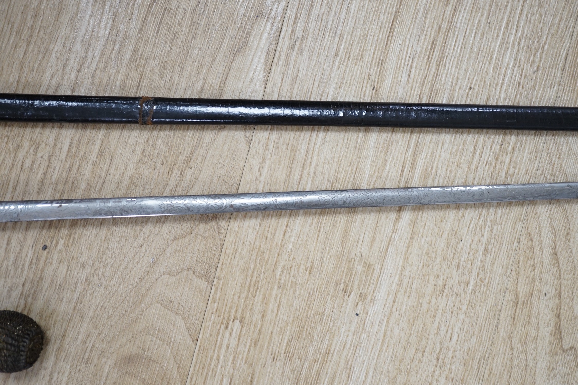 A 19th century officer's dress sword, made by Silver &Co. London with scabbard and leather cover - Image 3 of 5