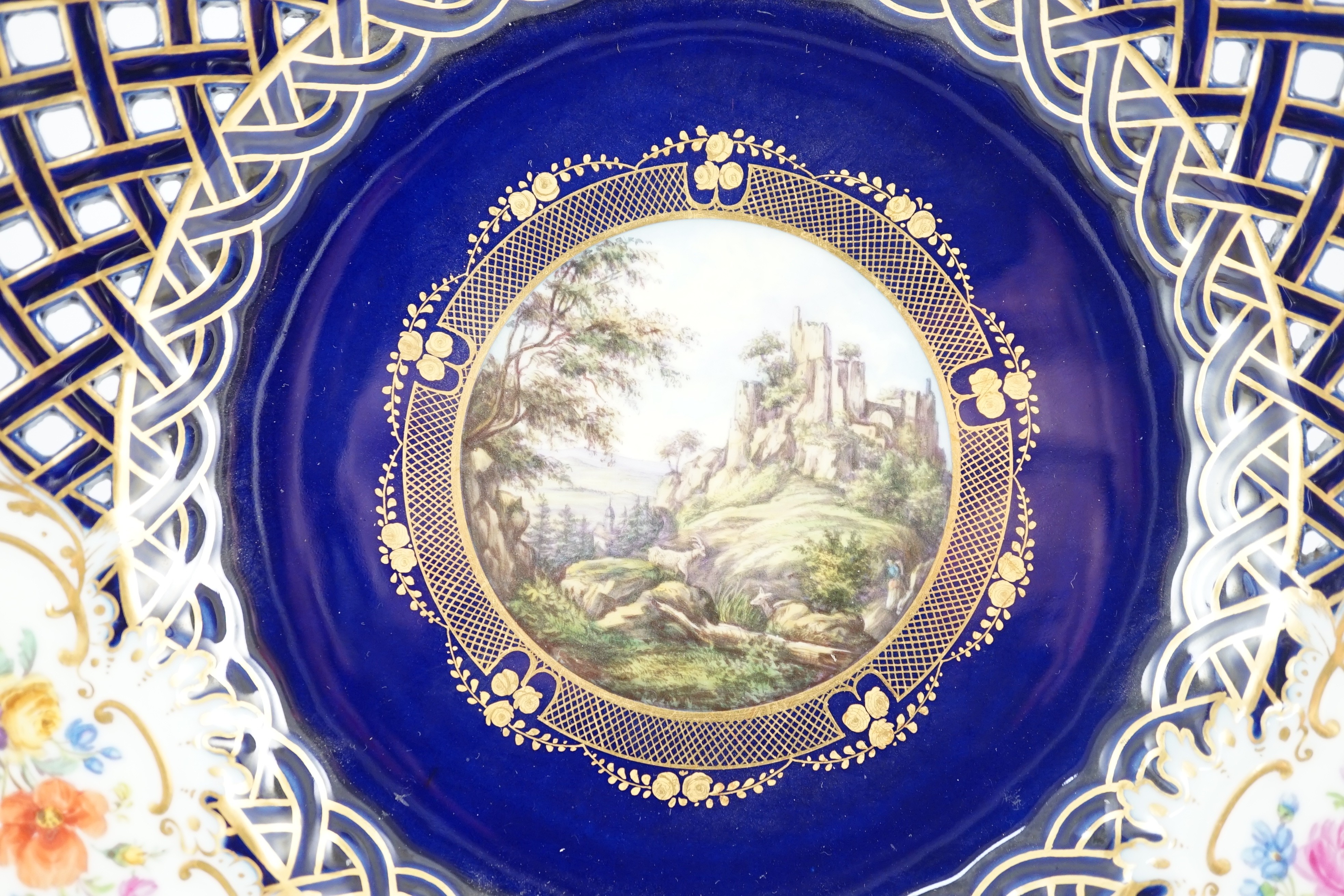 A pair of Meissen reticulated named view plates, 19th century, painted to the centre with named - Image 3 of 6