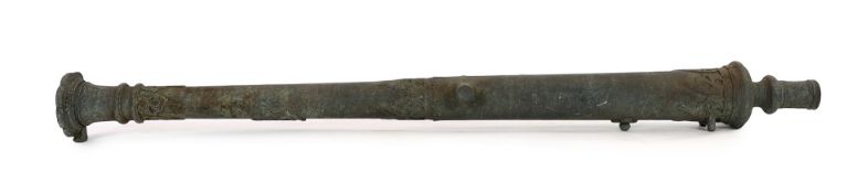 An 18th century Indonesian bronze Lantaka cannon, inscription to the barrel, 125cm long***