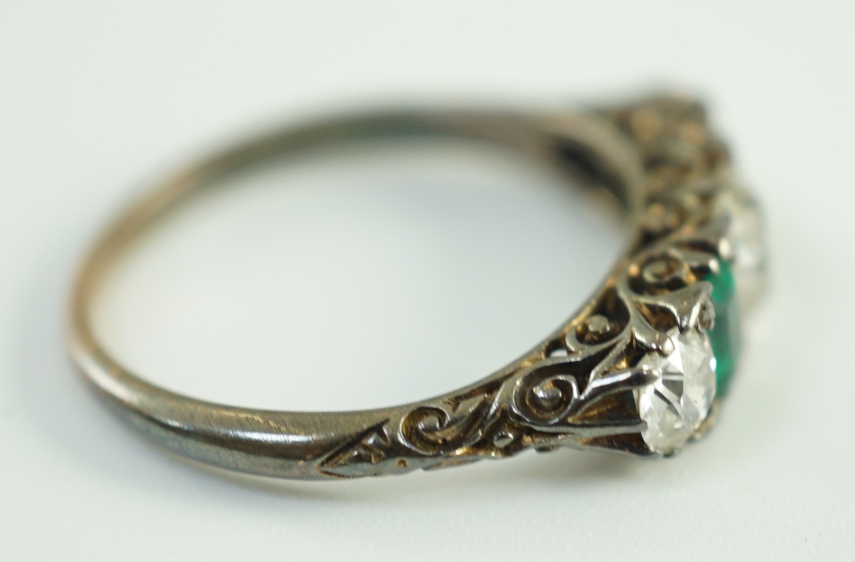 An early 20th century 18ct gold, three stone diamond and two stone emerald set half hoop ring, - Image 10 of 10