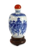 A Chinese blue and white snuff bottle, Yongzheng mark, 1850-1900, painted with dignitaries on