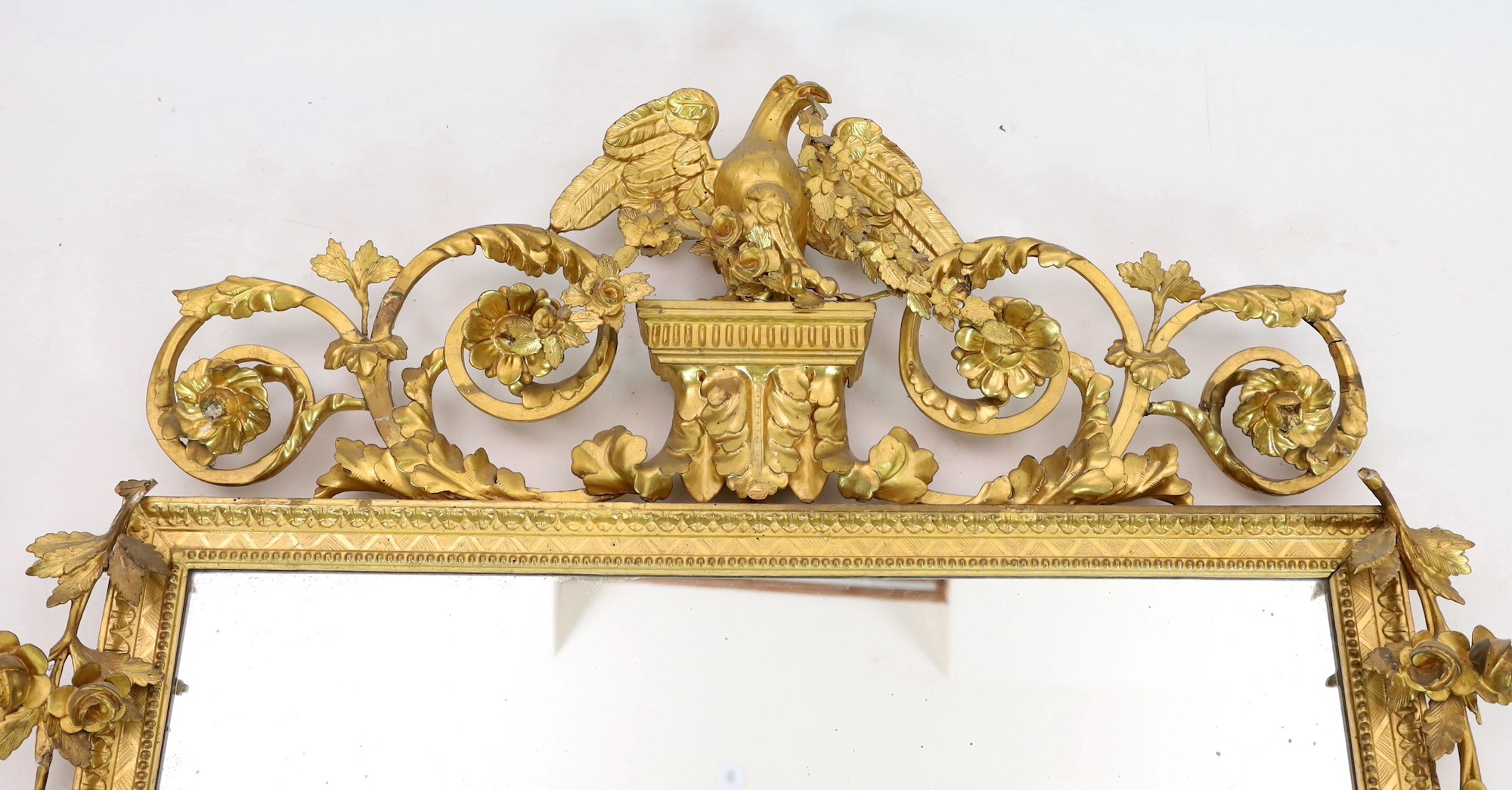 A 19th century century carved giltwood wall mirror, with elaborate ornate eagle and flowering swag - Image 3 of 4