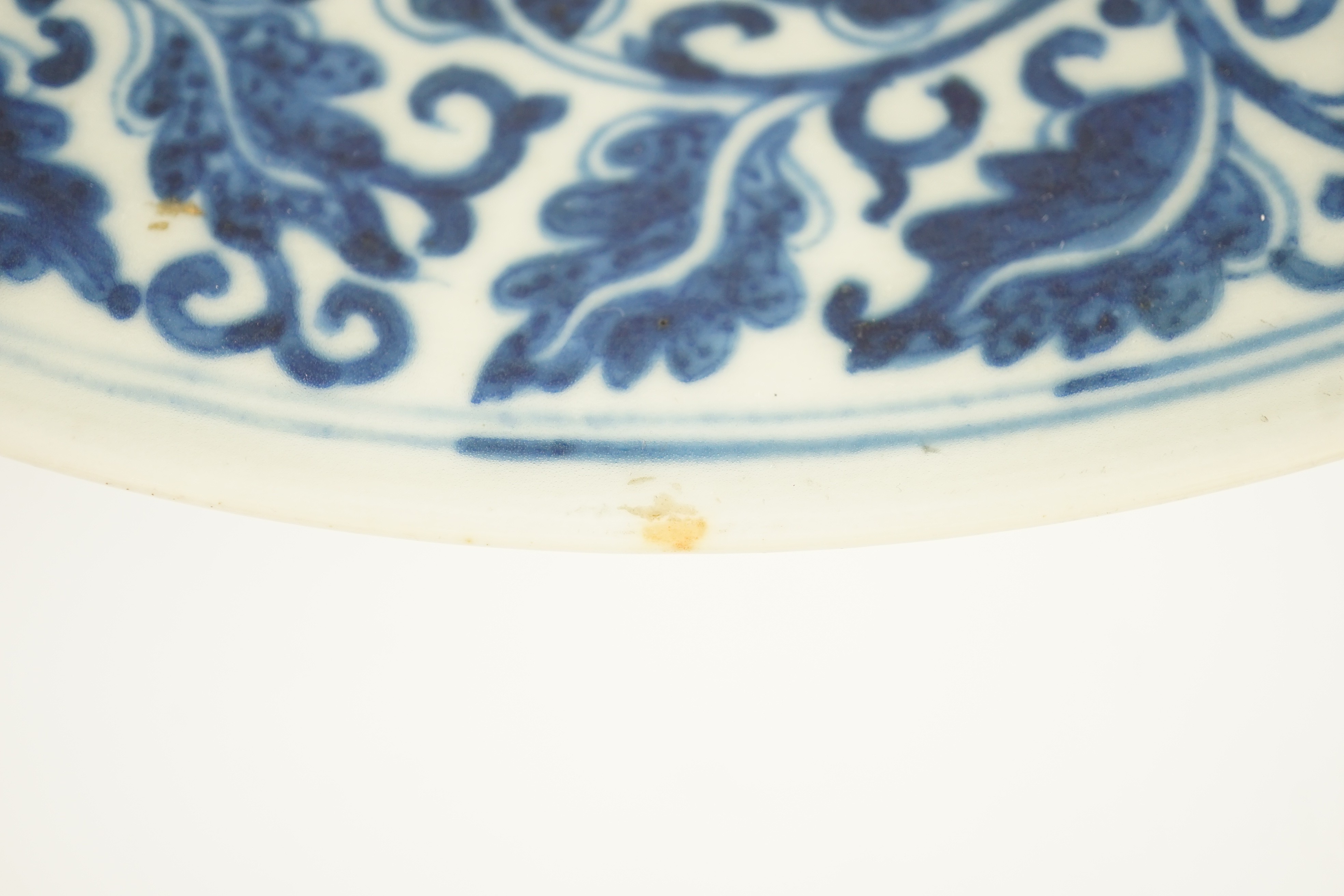 A Chinese blue and white dish, Kangxi mark, 19th century, the centre painted with four - Image 5 of 7