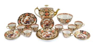 A Spode part tea service painted in Imari style with pattern 1956, c.1820, comprising a teapot cover