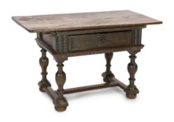 A late 17th century Dutch oak side table, with rectangular top and frieze drawer, on baluster legs