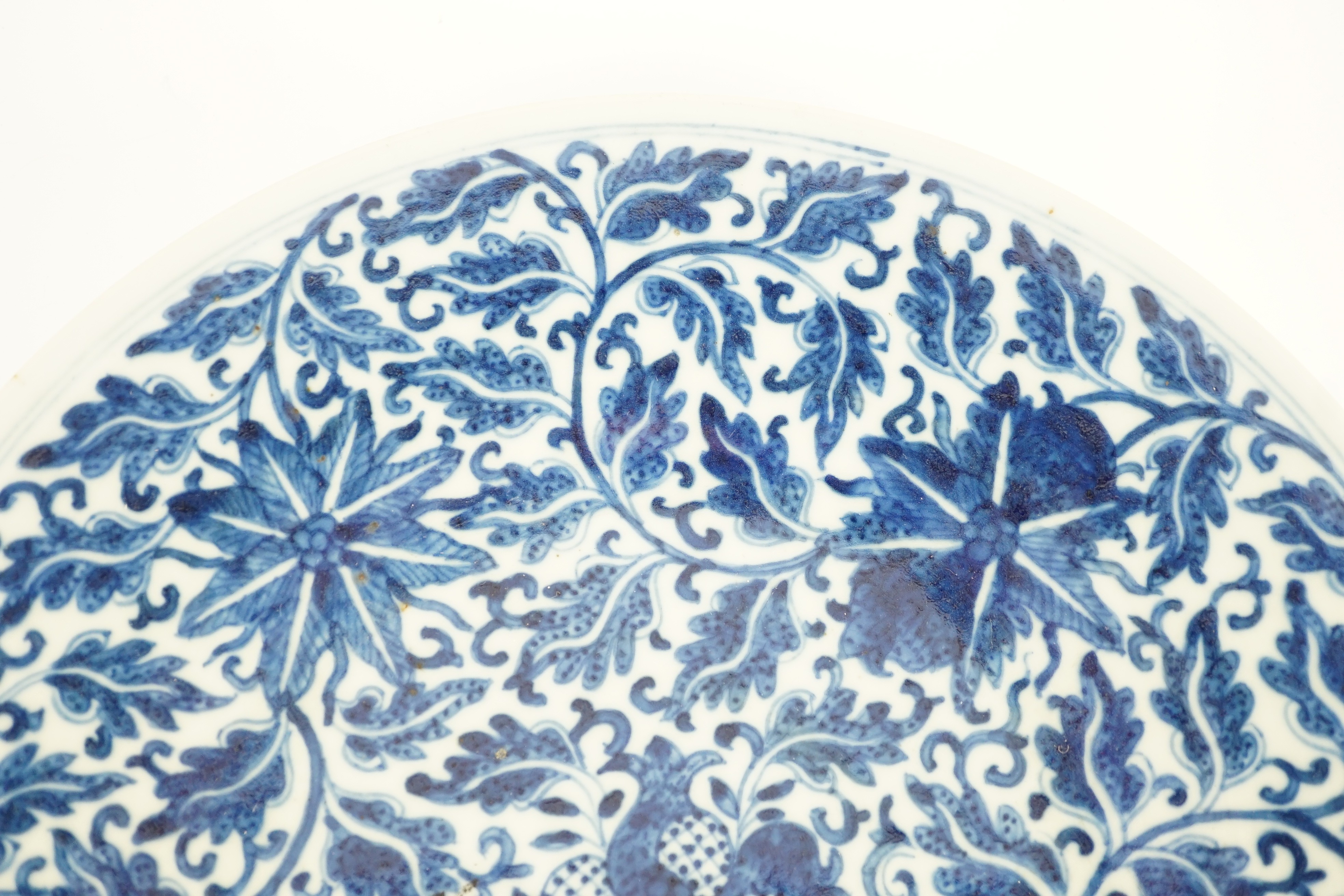 A Chinese blue and white dish, Kangxi mark, 19th century, the centre painted with four - Image 2 of 7