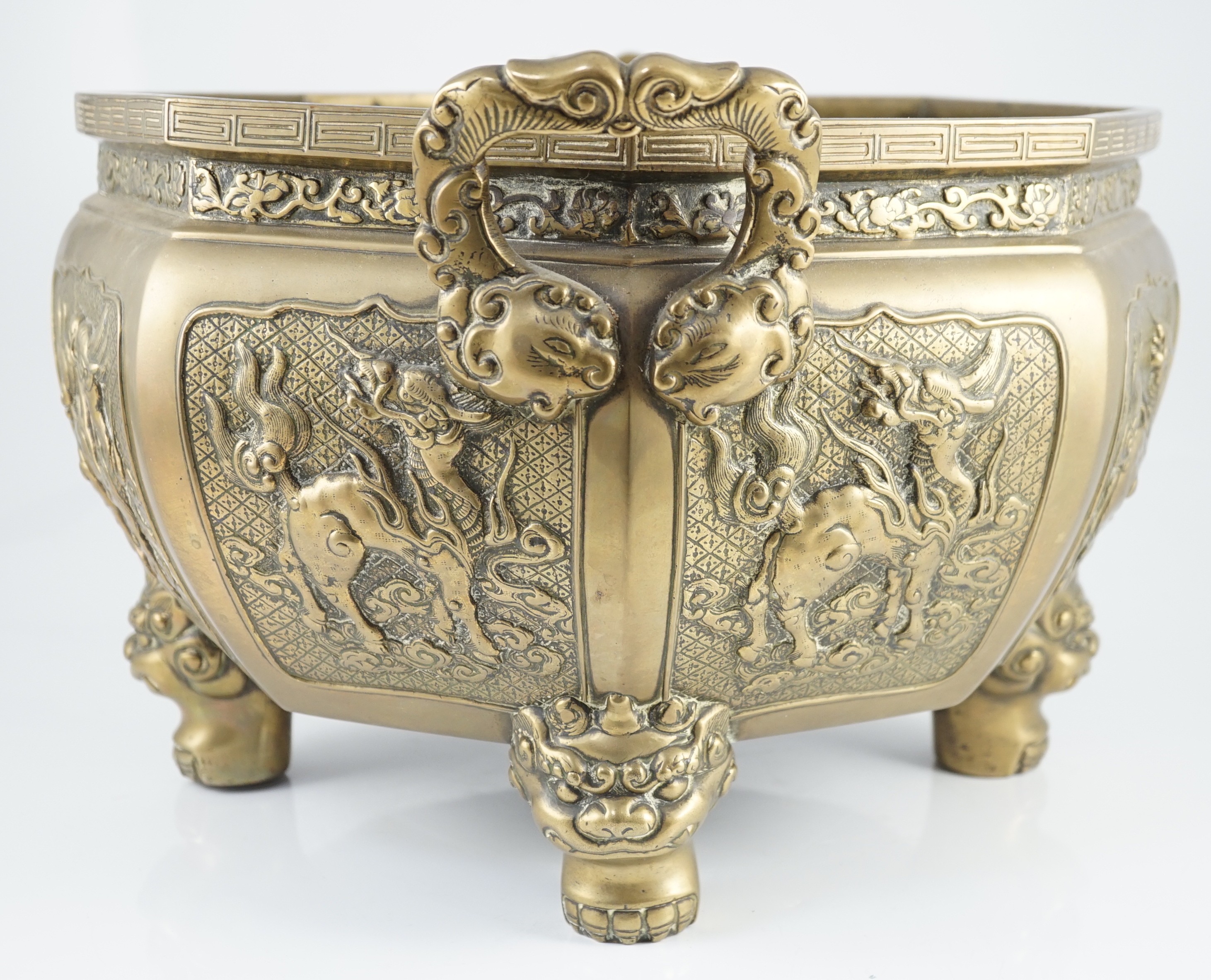 A large Chinese polished bronze octagonal jardiniere, 19th century, each side cast in relief with - Image 7 of 9